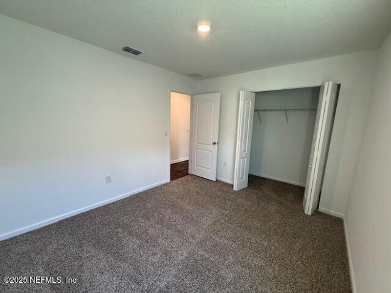 Spacious, unfurnished interior of a new home in Grand Reserve, Bunnell (Image 23).