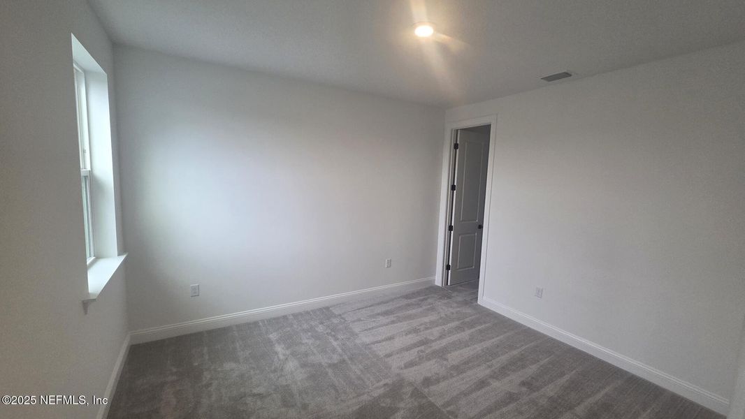 Spacious, unfurnished interior of a new home in , St. Johns (Image 22).