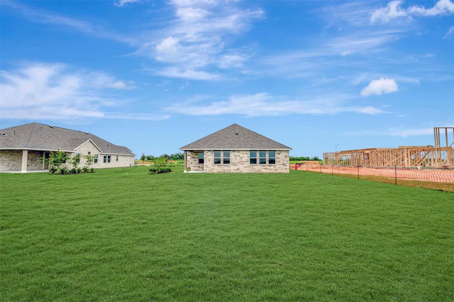 Exterior details and patio area of a home in Cane Crossing Estates, Sealy (Image 28).