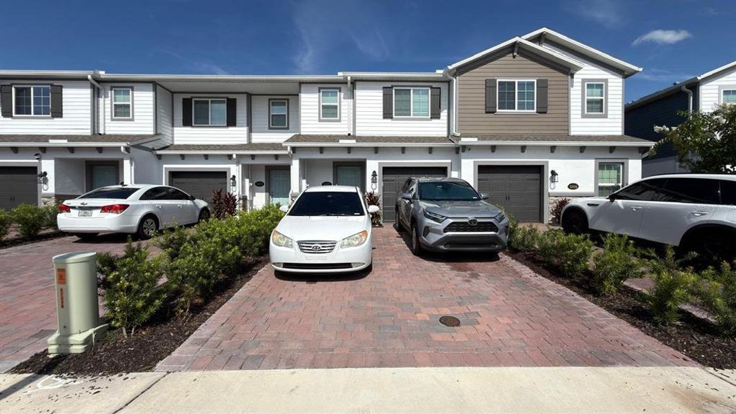Front exterior of a new home in , St. Cloud, FL, highlighting curb appeal (Image 21).