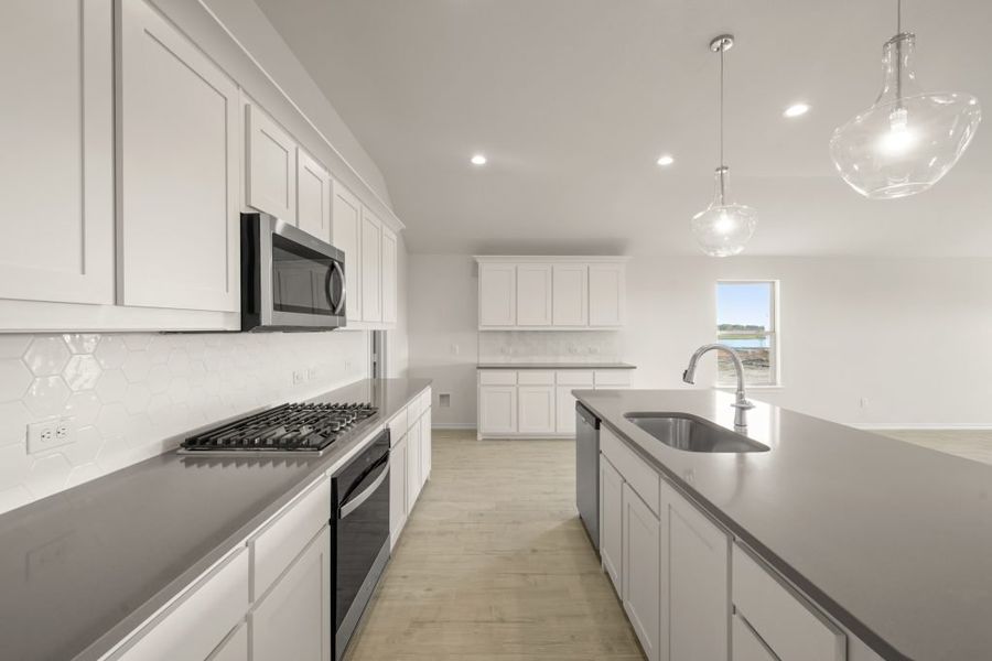 Front exterior of a new home in Myrtle Creek, Waxahachie, TX, highlighting curb appeal (Image 8). Front exterior of a new home in Myrtle Creek, Waxahachie, TX, highlighting curb appeal (Image 8).