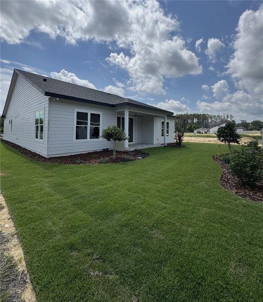 Exterior details and patio area of a home in Laureate Village, Newberry (Image 2).