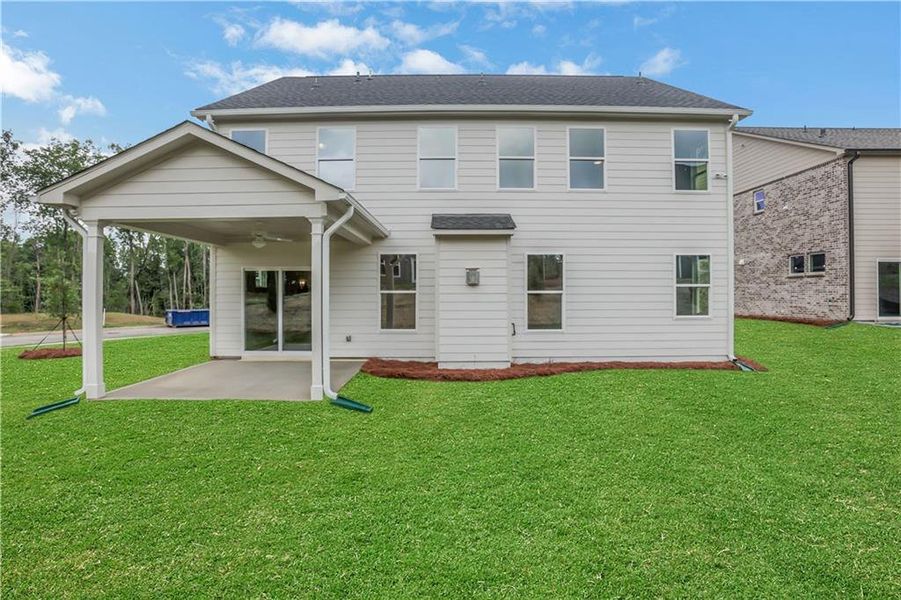 Exterior details and patio area of a home in , Loganville (Image 25).