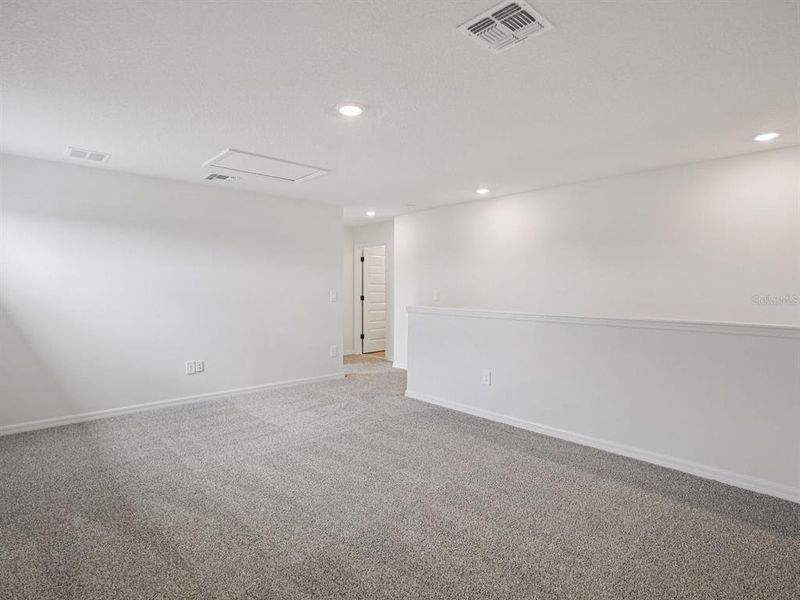 Spacious, unfurnished interior of a new home in Oakfield Trails - Signature Series, Parrish (Image 4).