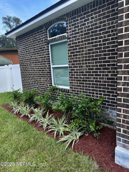 Front exterior of a new home in , Jacksonville, FL, highlighting curb appeal (Image 16).