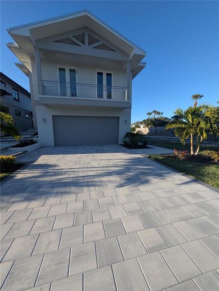 Front exterior of a new home in , Sarasota, FL, highlighting curb appeal (Image 2). Front exterior of a new home in , Sarasota, FL, highlighting curb appeal (Image 2).