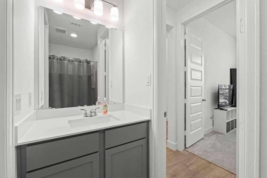 Another view of this secondary bathroom that services Bedrooms 3 and 4.