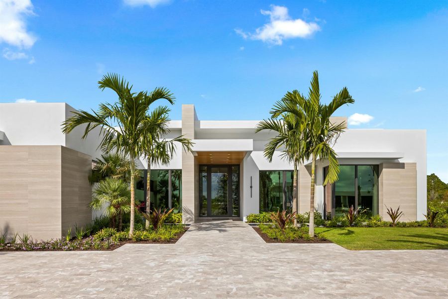 Front exterior of a new home in , Palm Beach Gardens, FL, highlighting curb appeal (Image 2). Front exterior of a new home in , Palm Beach Gardens, FL, highlighting curb appeal (Image 2).