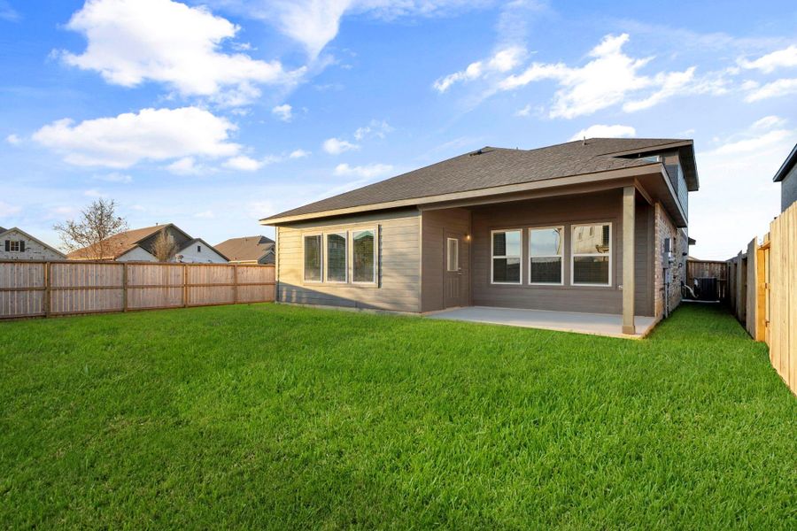 A view of the backyard from another angle highlights its generous size and the home’s beautiful exterior design. The wide-open space is ideal for creating your dream outdoor retreat or hosting weekend barbecues. A view of the backyard from another angle highlights its generous size and the home’s beautiful exterior design. The wide-open space is ideal for creating your dream outdoor retreat or hosting weekend barbecues.