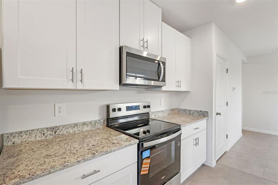 Furnished interior view inside a new home in Leyland Preserve - Premier Series, Brooksville (Image 7).