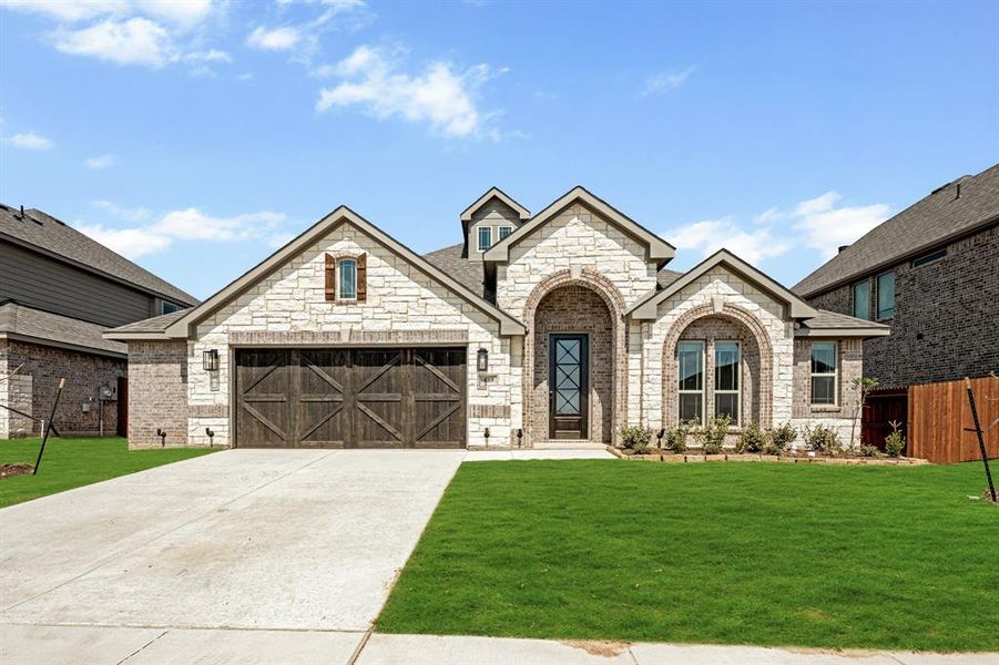 Front exterior of a new home in The Retreat at North Grove 60, Waxahachie, TX, highlighting curb appeal (Image 22).