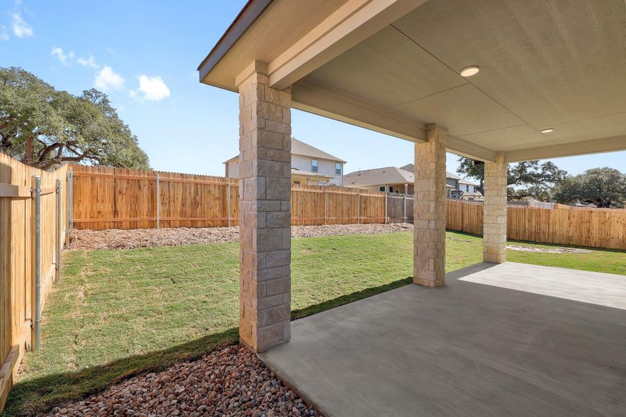 Exterior details and patio area of a home in River Bluff, Leander (Image 19).
