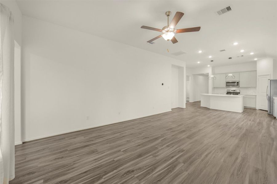 Spacious, unfurnished interior of a new home in Bridgeland, Cypress (Image 30).