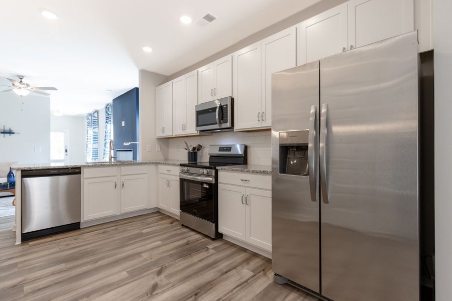 Furnished interior view inside a new home in Cantigny Park, Clarksville (Image 5). Furnished interior view inside a new home in Cantigny Park, Clarksville (Image 5).