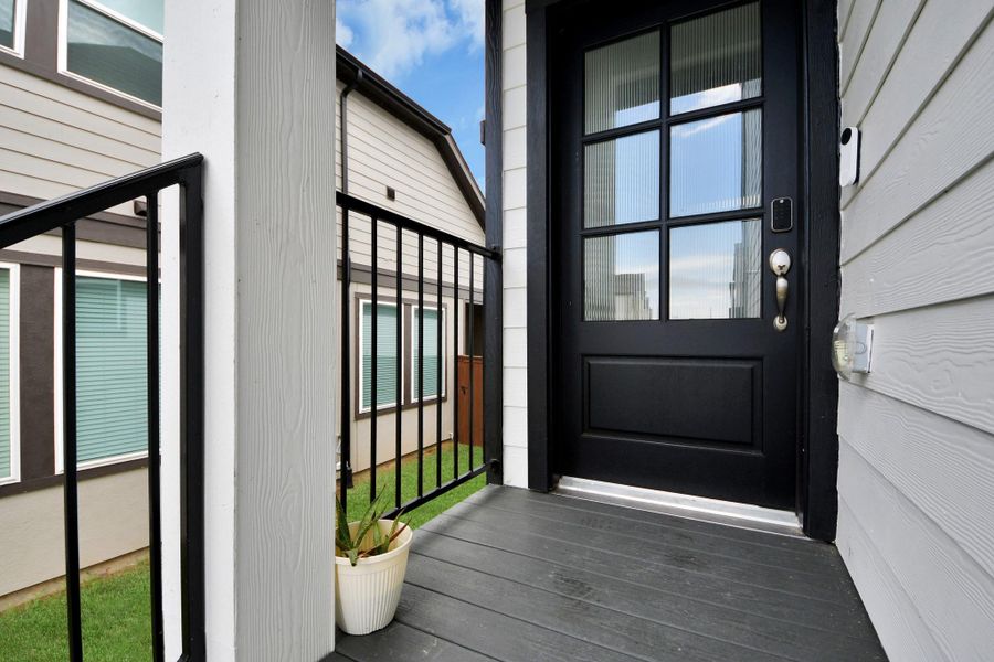 Exterior details and patio area of a home in Meridiana Courtyard Collection, Manvel (Image 26).