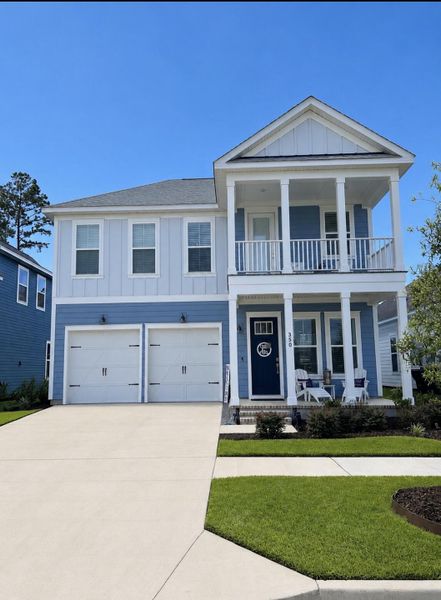 Front exterior of a new home in Midtown at Nexton, Summerville, SC, highlighting curb appeal (Image 2). Front exterior of a new home in Midtown at Nexton, Summerville, SC, highlighting curb appeal (Image 2).