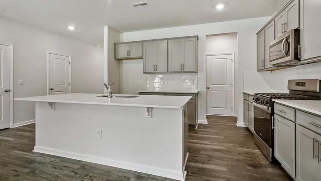 Representative furnished interior of a home built from the DANIEL by D.R. Horton in The Townes Park, Apex (Image 7). Representative furnished interior of a home built from the DANIEL by D.R. Horton in The Townes Park, Apex (Image 7).