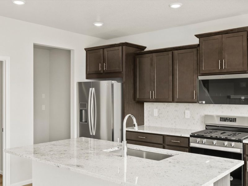Furnished interior view inside a new home in Buffalo Highlands: The Canyon Collection, Commerce City (Image 5).