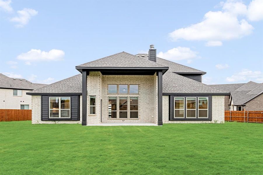 Front exterior of a new home in Sunrise at Garden Valley 60-79, Waxahachie, TX, highlighting curb appeal (Image 1).