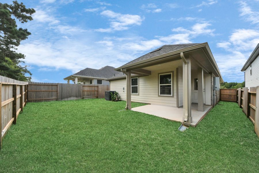 Exterior details and patio area of a home in Montgomery Ridge, Montgomery (Image 3).