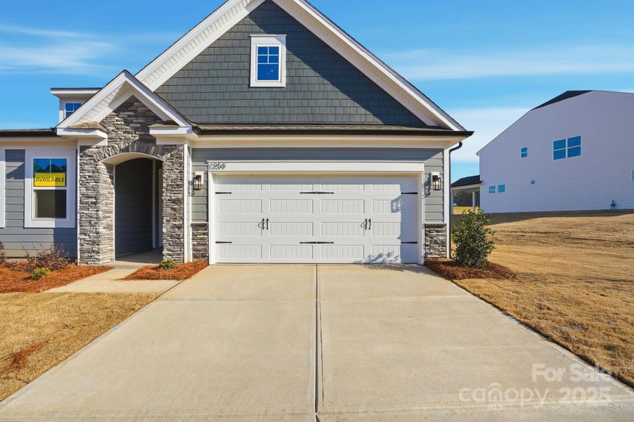 Front exterior of a new home in Carrington, Stanley, NC, highlighting curb appeal (Image 25).