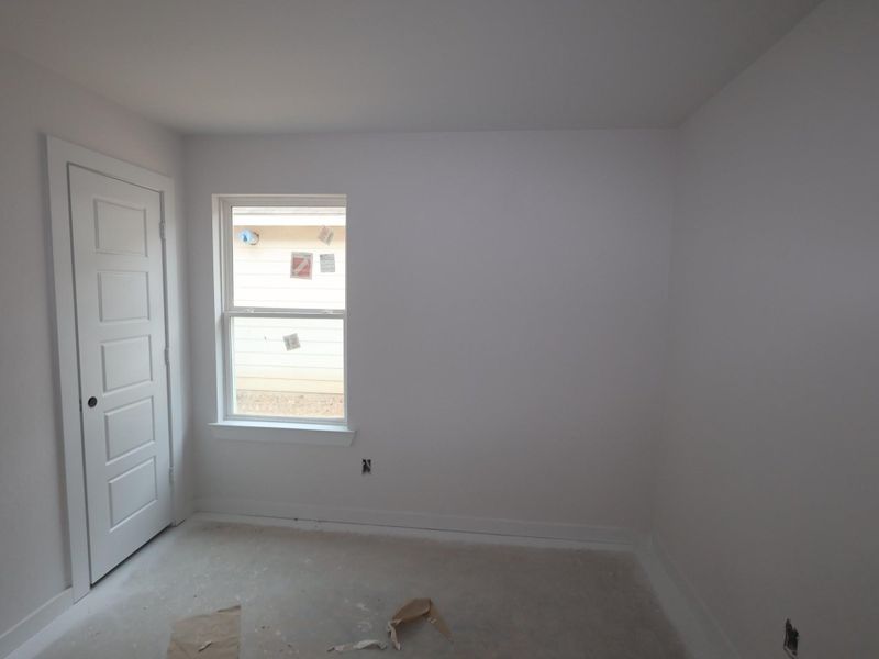 Spacious, unfurnished interior of a new home in Pinewood at Grand Texas, New Caney (Image 21).