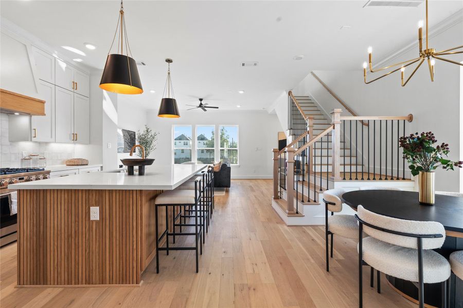 Open-concept kitchen and living area with a warm, inviting atmosphere.