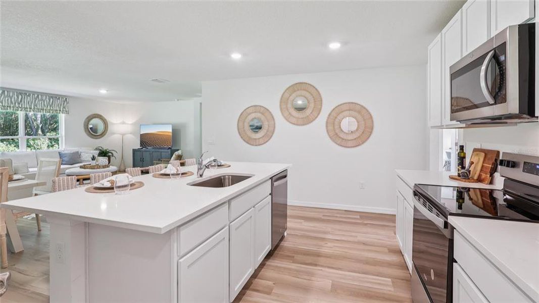 Furnished interior view inside a new home in Triumph South, Wildwood (Image 7).
