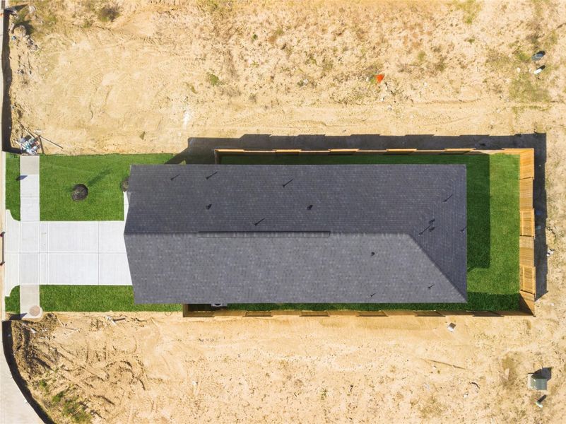 Exterior details and patio area of a home in Sweetgrass Village, Crosby (Image 26). Exterior details and patio area of a home in Sweetgrass Village, Crosby (Image 26).