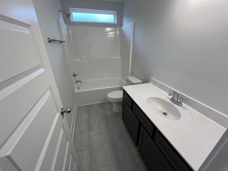One of 3 full bathrooms One of 3 full bathrooms