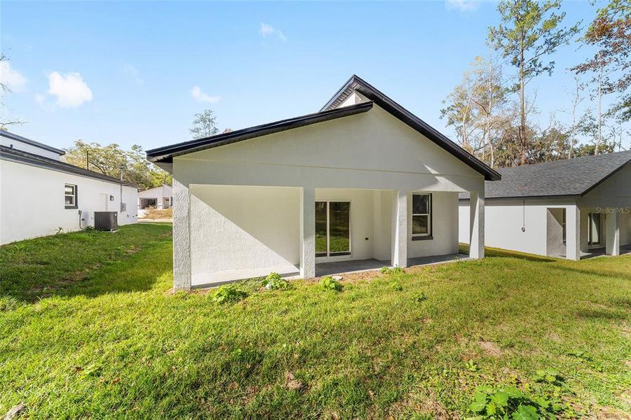Exterior details and patio area of a home in , Ocala (Image 23).