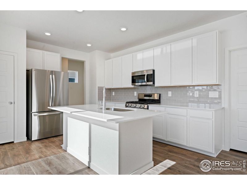 Furnished interior view inside a new home in Hudson Hills, Hudson (Image 3).