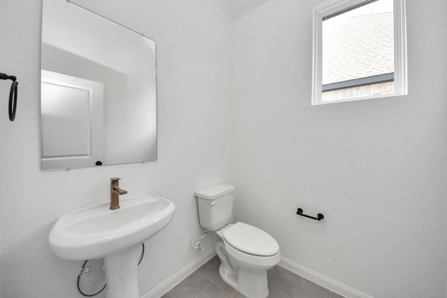 Furnished interior view inside a new home in 50' Traditional Homes at Elyson, Katy (Image 5).