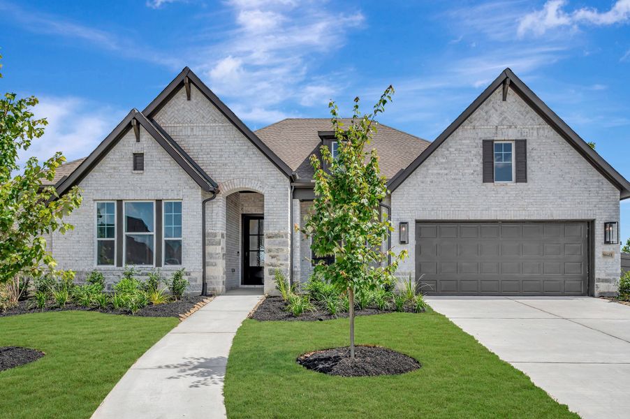 Front exterior of a new home in ARTAVIA - Parkview Collection, Conroe, TX, highlighting curb appeal (Image 26).