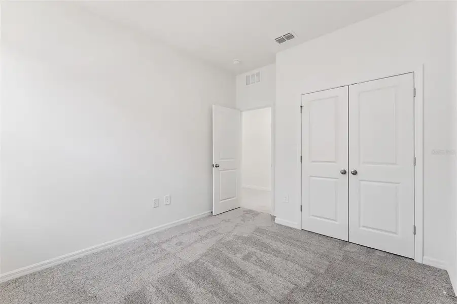 Spacious, unfurnished interior of a new home in Estes Reserve, Eustis (Image 14).