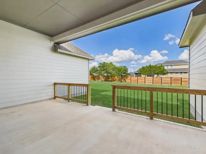 Exterior details and patio area of a home in Potranco Oaks, Castroville (Image 4).