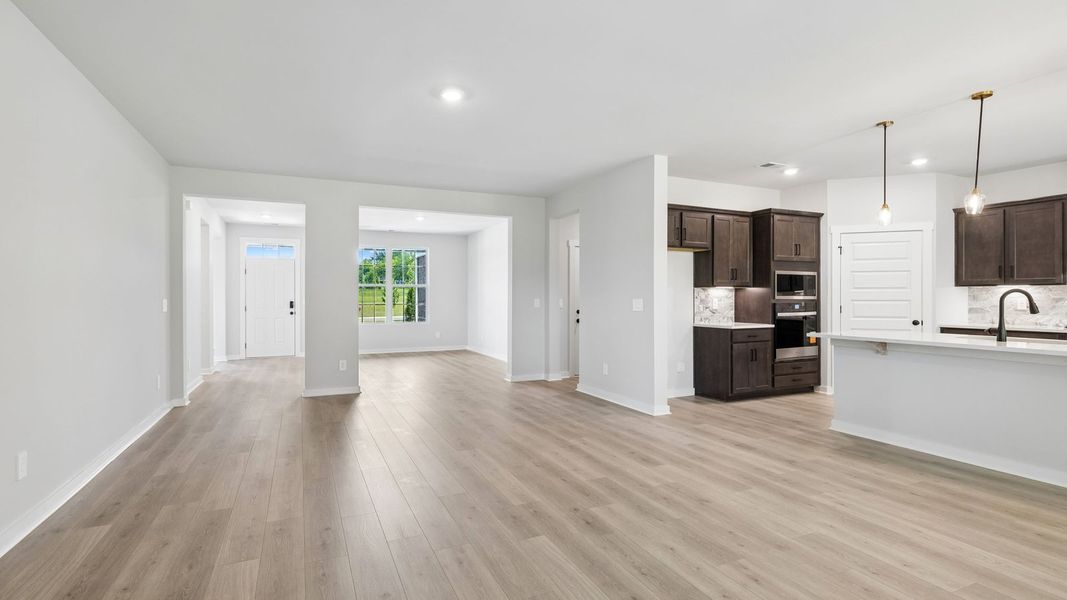 Representative unfurnished interior of a home built from the Ansley by D.R. Horton in Harvest Point, Spring Hill (Image 56).