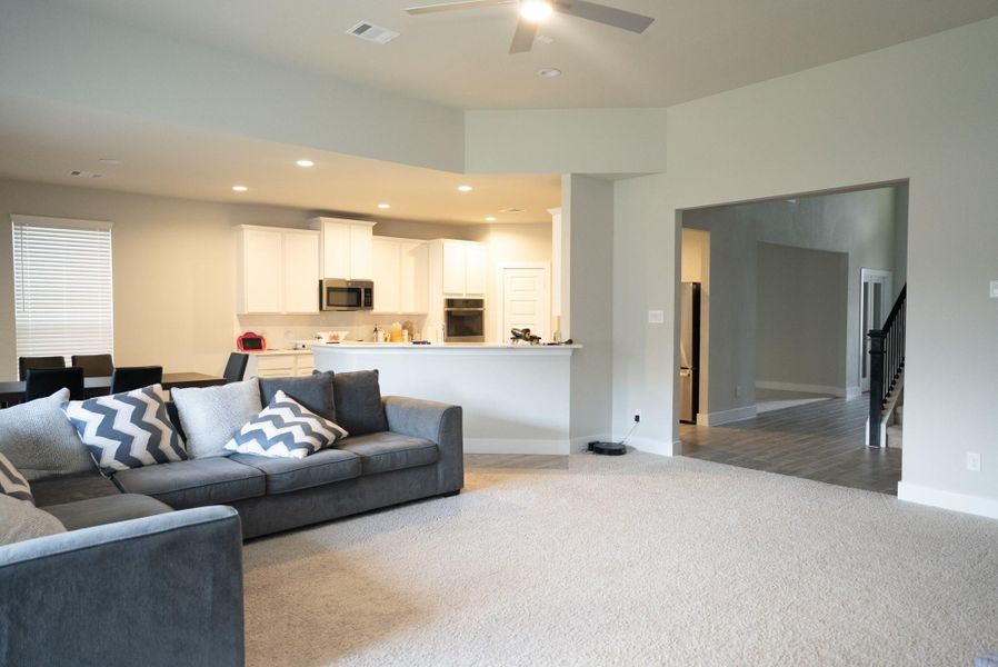 Furnished interior view inside a new home in Sunterra, Katy (Image 14).