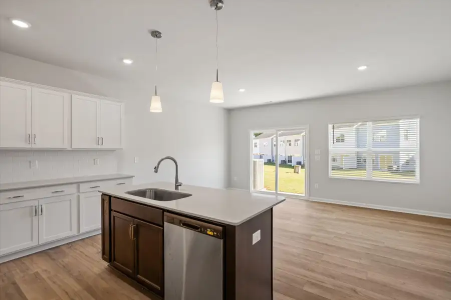 Furnished interior view inside a new home in West Main Townhomes, Sanford (Image 4).