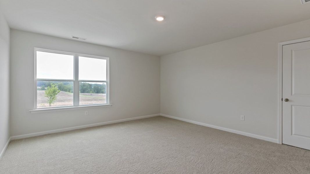 Spacious, unfurnished interior of a new home in The Grove at Matthews Landing, Fuquay Varina (Image 22).