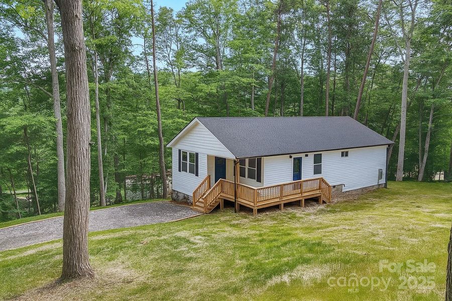 Front exterior of a new home in , Candler, NC, highlighting curb appeal (Image 22).