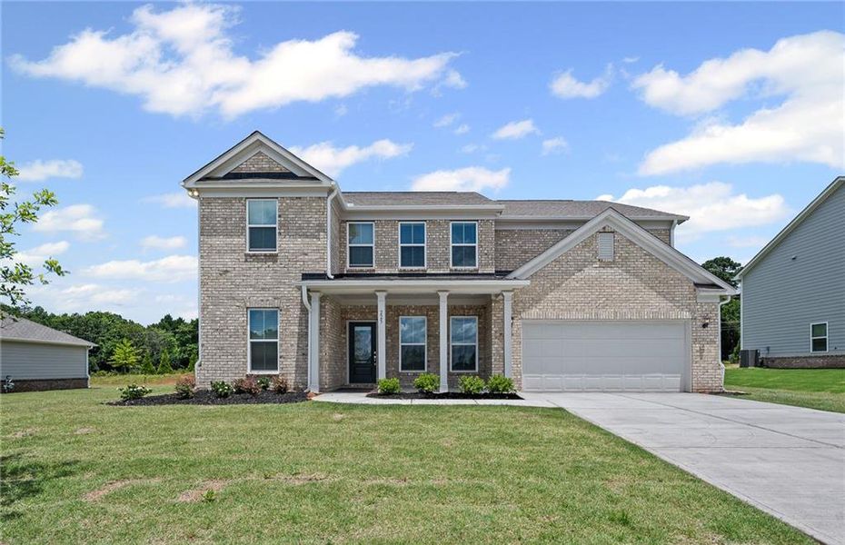 Front exterior of a new home in Anderson Point Estates, McDonough, GA, highlighting curb appeal (Image 24).