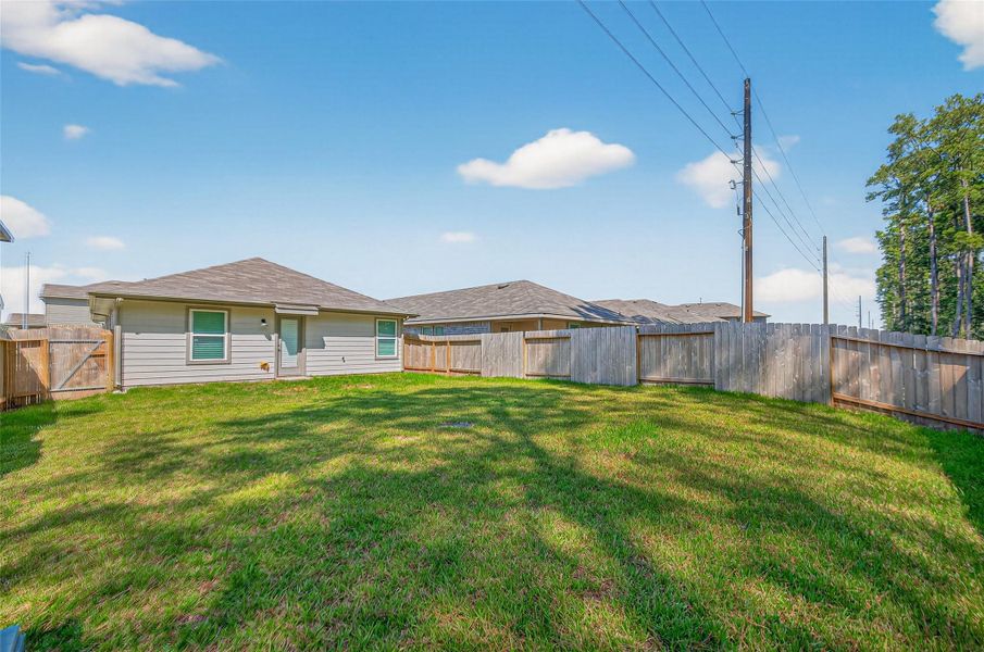 Front exterior of a new home in Breckenridge Forest, Spring, TX, highlighting curb appeal (Image 11).
