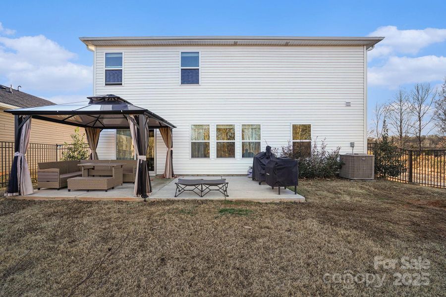 Exterior details and patio area of a home in Shepherds Landing, Mooresville (Image 4).
