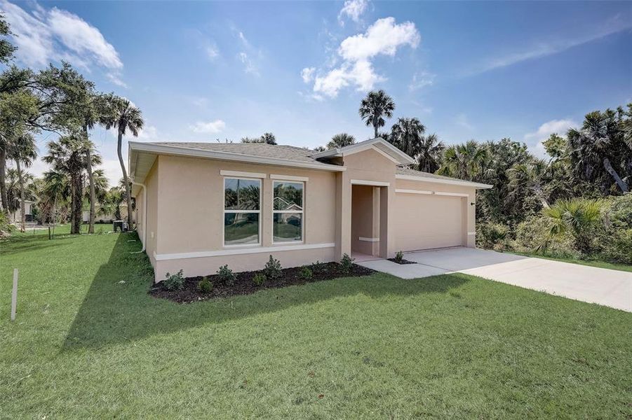 Front exterior of a new home in Citrus Springs, Citrus Springs, FL, highlighting curb appeal (Image 10).