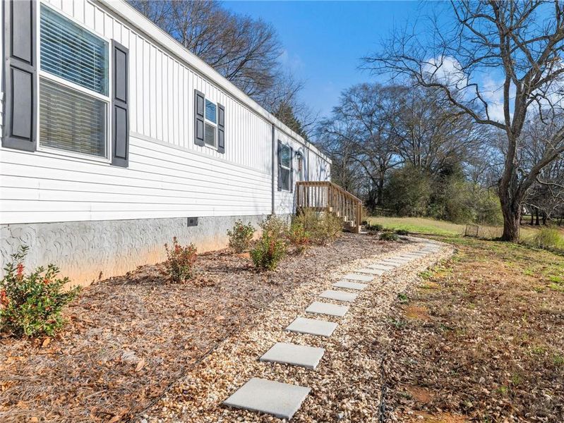 Exterior details and patio area of a home in , Danielsville (Image 22).