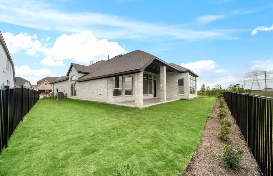 Exterior details and patio area of a home in Bridgeland 60′, Cypress (Image 22).