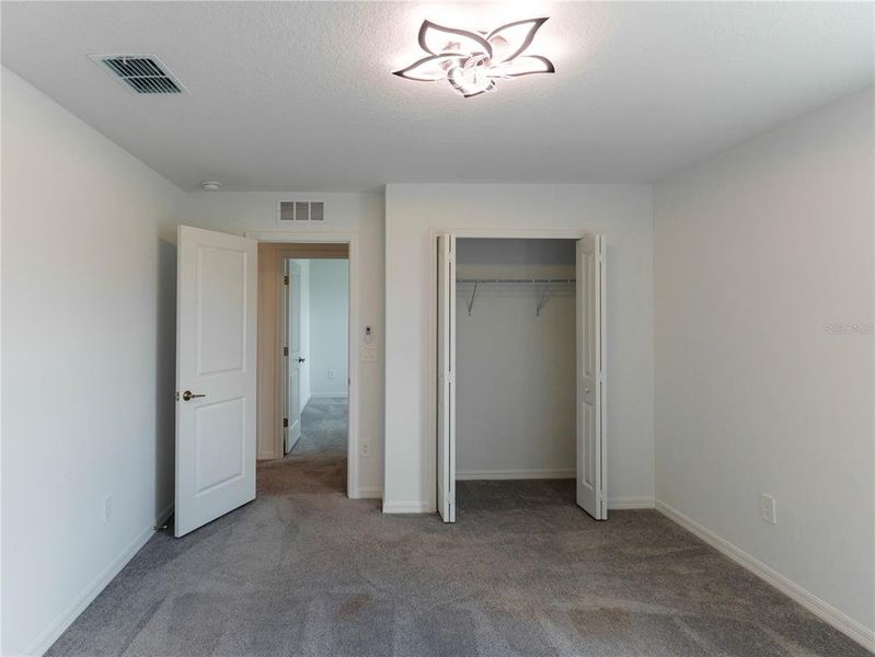 Spacious, unfurnished interior of a new home in The Isle of Avalon, Spring Hill (Image 31).