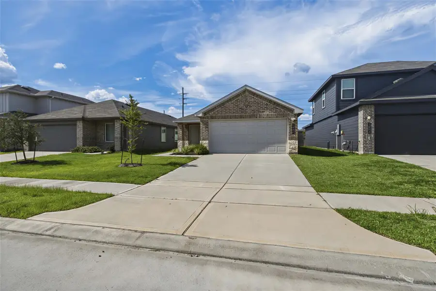 Front exterior of a new home in , Houston, TX, highlighting curb appeal (Image 19). Front exterior of a new home in , Houston, TX, highlighting curb appeal (Image 19).