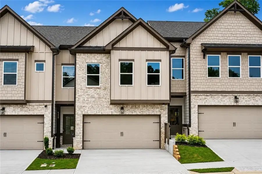 Front exterior of a new home in , Norcross, GA, highlighting curb appeal (Image 2). Front exterior of a new home in , Norcross, GA, highlighting curb appeal (Image 2).